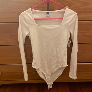 Brand new white body suit size small